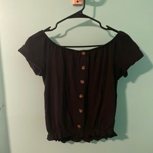 Off the shoulder black top.